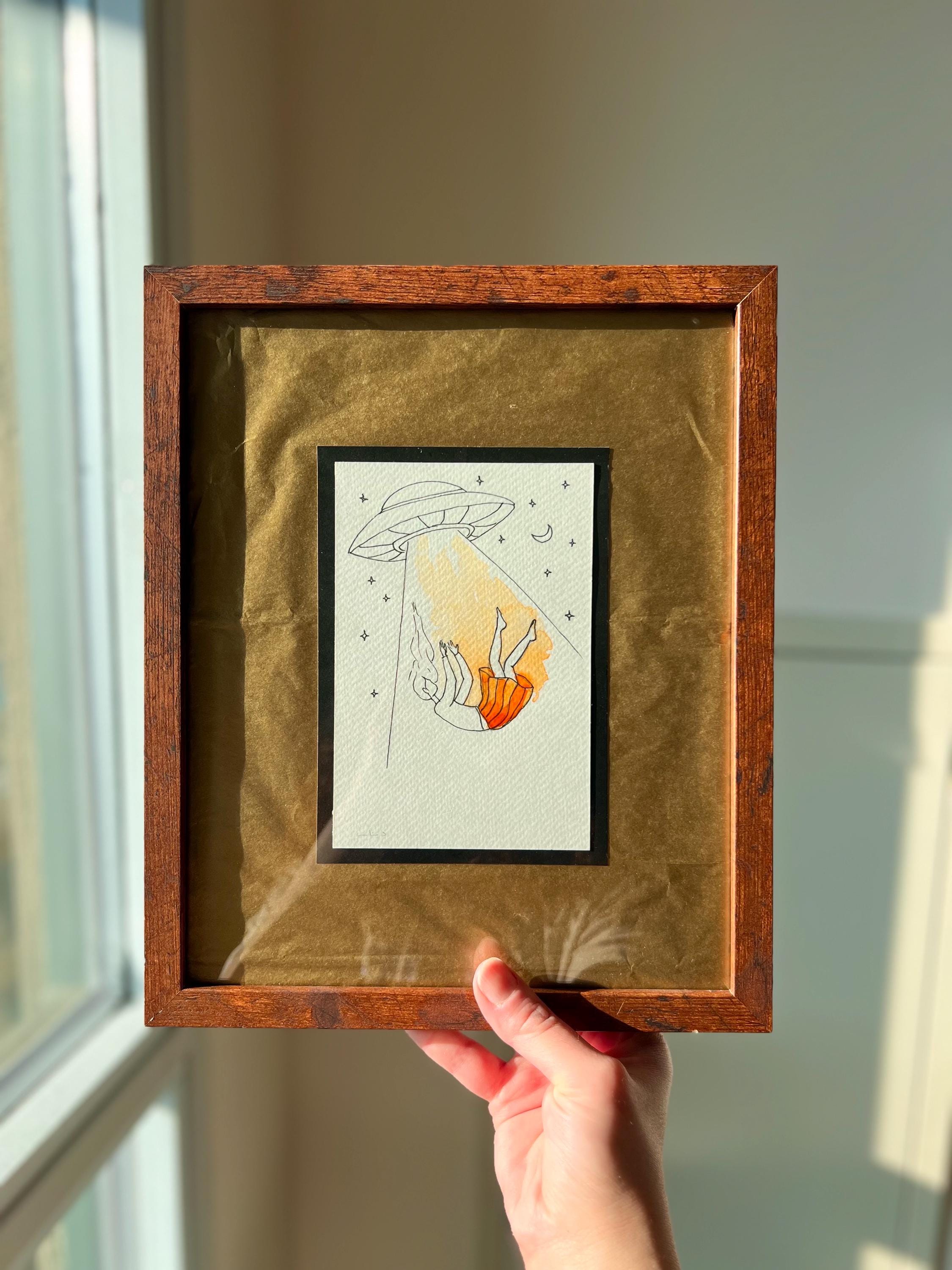 Original framed Watercolor UFO Girl taken by Spaceship - Cosmic Girl, Gold Background